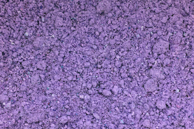 Purple crumbles of bath dust.